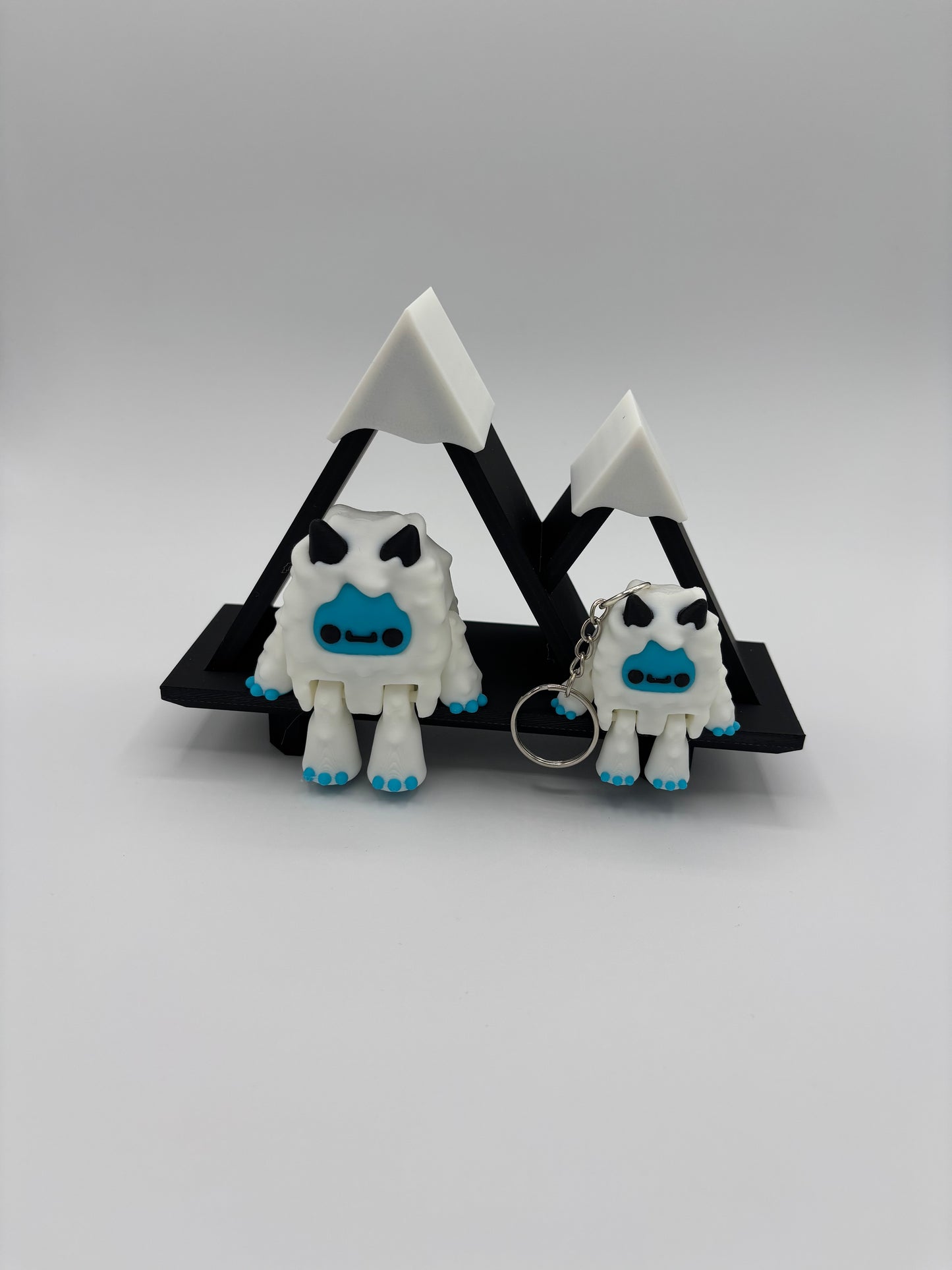 3d Printed Yeti figure and keychain option with mountain shelf option. super cute Realistic